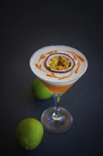 Mango cocktail with lemon and passion fruit maracuya