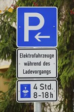 Parking sign for electric vehicles in Berlin Kreuzberg, Electric vehicles during charging, hours, 8