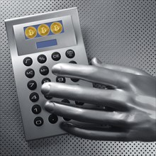 Calculator with bitcoin btc coin and futuristic silver hand