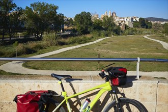 Ribarroja del turial village from old stone bridge with bicycle at valencia spain