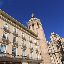 Valencia Cathedral facade and Miguelete Micalet in Plaza de la Reina at Spain