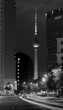 Nightly view from Axel-Springer-Strasse to the Berlin TV tower at Alexanderplatz, a prominent