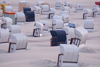 Near view of beach chairs on sandy beach, Borkum, North Sea, GERMANY