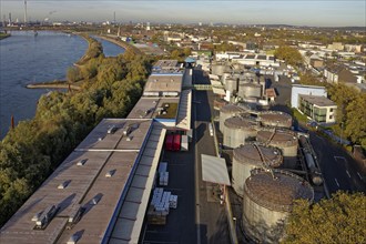 Stainless steel tanks storing chemicals at the Rhine river in Germany. The Chemicals are being