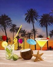 Beach cocktail sunset on palm tree sand mojito margarita coconut