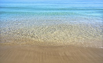 Clear beach water sand in Costa Blanca of Alicante at Spain Mediterranean