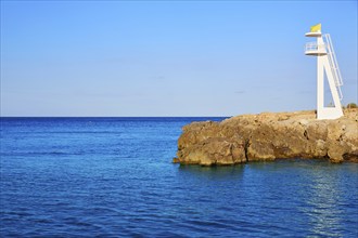 Denia Las Rotas Trampoli beach and tower in Mediterranean Spain Alicante