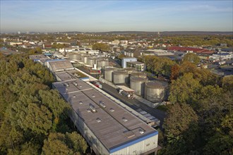 Stainless steel tanks storing chemicals at the Rhine river in Germany. The Chemicals are being