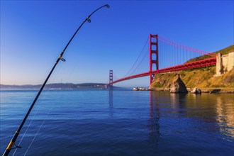 San Francisco Golden Gate Bridge with fishing rod California USA