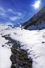 Cerler snow stream in Pyrenees of Huesca in Spain