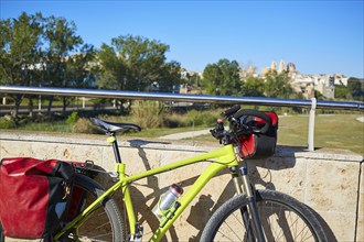 Ribarroja del turial village from old stone bridge with bicycle at valencia spain