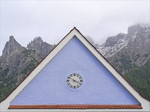 Roof ridge of Mittenwald railway station in front of the Karwendel mountains. Bavaria, Germany,