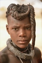 Himba girl with typical hairstyle, Omuramba, Kaokoland, Kunene, Namibia, Africa