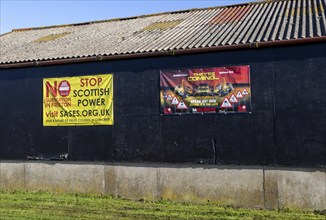 Protest campaign banners against Scottish Power and National Grid proposed electricity substation