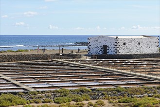 Historic salt works for salt extraction, today the salt museum Museo de la Sal, in the foreground