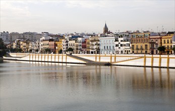 Historic houses on Calle Betis in the Triana district on the banks of the Guadalquivir river,