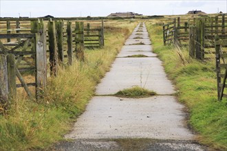 Orford Ness lighthouse Open Day, September 2017, Suffolk, England, UK, old military road crossing