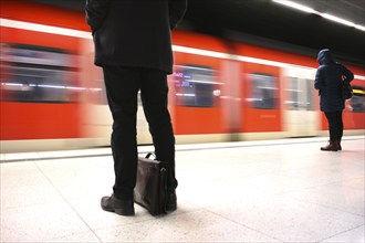 Underground arriving S-Bahn, train, platform, stop, station city centre, public transport, movement