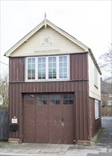 Historic old fire engine house building in large village of Pewsey, Wiltshire, England, UK