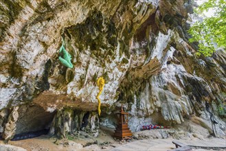 Hiking trail with stuffed animals as sculptures at Phra Nang beach near Krabi, symbol, religion,