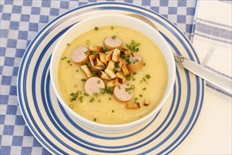 Swabian cuisine, potato soup with string sausages and pretzel croutons, hearty, savoury, typical