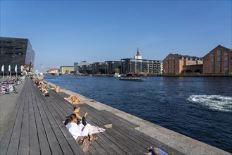 Summer, swimming in the harbour of Copenhagen, there are official bathing places, harbour baths and