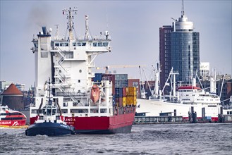 Container freighter, feeder ship on the Elbe, Elbe Philharmonic Hall, Hamburg, Germany, Europe