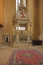 Baptismal font and carpet, interior view of the UNESCO cathedral, arts and crafts, baptismal font,