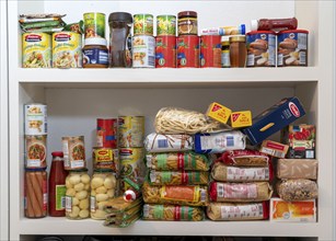 Emergency preparedness, food stock in a private household, shelf, pantry, with long-life food,