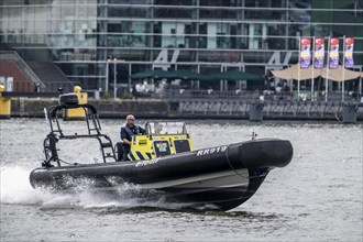 Rijkswaterstaat speedboat on the IJ, Amsterdam Netherlands