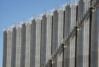 Stainless steel tanks of a large silo facility in Duisburg inland harbour, Duisburg-Neuenkamp, for