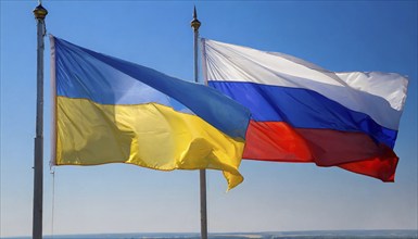 The flags of Ukraine and Russia, EU, flutter together in the wind, AI generated