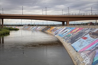 Pueblo, Colorado, Murals line a concrete levee for three miles along the Arkansas River. The levee