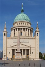 Historic cathedral with green dome under a clear blue sky, St. Nicholas Church, Alter Markt,