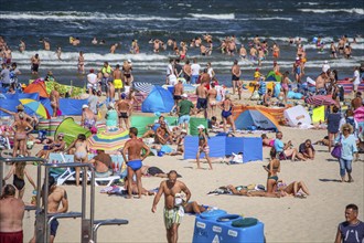 Beach holiday, many People on the beach in Swinoujscie, Western Pomerania, Baltic Sea, Poland, East