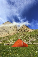 Tent at the foot of a rock face, Buneset, Moskenesöya, Lofoten, Nordland, Norway, Norway, Europe