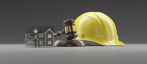 Miniature model house, yellow hard hat and gavel on a gradated background