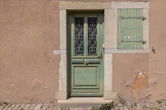 House facade with green door and window, Cluny, Saône-et-Loire, Burgundy, France, Europe