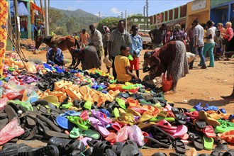 South Ethiopia, market in Jinka, market day, trade with plastic sandals, plastic shoes, market