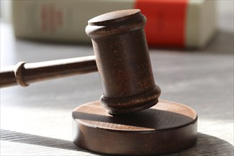 Close-up of a judge's gavel as a symbolic image for a court judgement