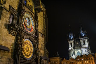 Night shot with the astronomical clock and St Mary's Church, Old Town, Prague, Czech Republic,