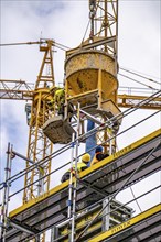 Concreting work on a construction site, new construction of a high-rise office building, facade of