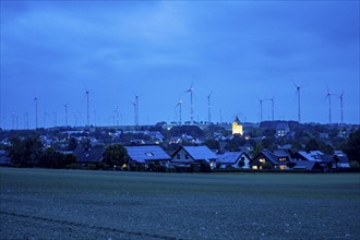 Wind farm above the village of Lichtenau, self-proclaimed energy town, houses with photovoltaic