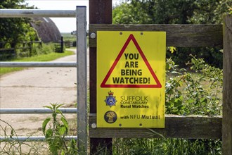 NFU and Suffolk Constabulary police rural watch notice on farm fence, Boyton, Suffolk, England, UK