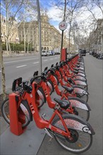 Red hire bikes from bicing, Gran Via de les Corts Catalanes, Barcelona, Catalonia, Spain, Europe