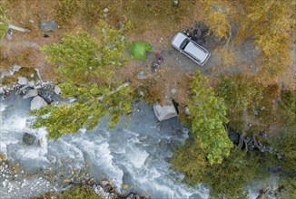 View down, aerial view, tent and camm, Ala Archa mountain stream, Ala Archa National Park, Khirgiz