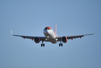 Lisbon, Portugal - September 2, 2023: easyJet Airbus A320-214 passenger plane descends to land in