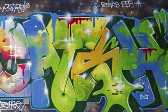 Graffiti in bright shades of green, blue and orange with colour gradient, Landau,