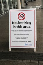 No smoking area sign, Stansted airport, Essex, England, UK