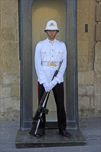 Uniformed soldier on duty outside Grand master's palace, Valletta, Malta, Europe